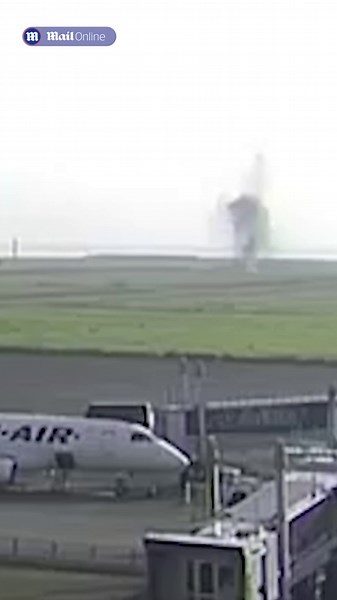 Dramatic moment as WWII bomb explodes near airport runway in Japan