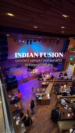 kristen’s eats on Instagram: "RESTAURANT/ BREWERY/ MUSIC VENUE/ LIBRARY - what does @windmills.dallas NOT have!?! This Indian fusion spot in the Colony is unbelievable. The inside is stunning- there is a jazz like concert hall experience with live music 🎷 and the walls are lined with hundreds of books that you can pick up and read while watching a show or grabbing a bite. 📕 Upstairs they have a full brewery which was INSANE to experience. You can pick dozens of craft beers that were made fresh