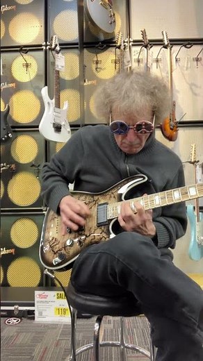 “Schecter Guitar Research C-1 Electro-Resin Electric Guitar - Natural with Black Burst” by Jan