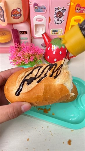 5.6K views · 51 reactions | Satisfying miniature kitchen, cutting bread with chocolate sauce ASMR video #shorts #toys #toyslover | Toys TV | Facebook