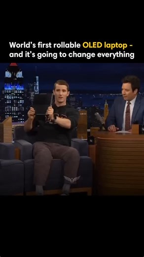 Mindset | Business | Growth on Instagram: "Linus Tech Tips went on Jimmy Fallon to showcase something that barely feels real: a Lenovo laptop with a rollable OLED display. Folded, it looks like a normal 14-inch notebook. Press a button—and the screen rises upward into a taller, expanded workspace. It’s the first commercially available laptop of its kind, and it hints at where personal computing is headed: dynamic displays, adaptive form factors, and devices that shift from “portable” to “product