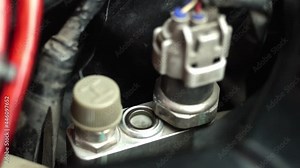 Check refrigerant with sight glass. Car air conditioner repair, Check the level of refrigerant, Refrigerant less. Sight glass.