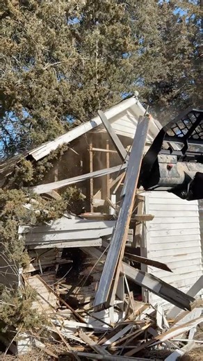 Always a good idea to stand back a little farther when watching demolition. The board had nails!