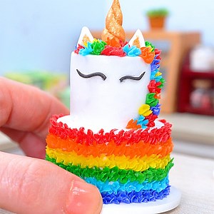 7.9K views · 482 reactions | Miniature Rainbow two-tier unicorn cake | Teeny Cakes | Facebook
