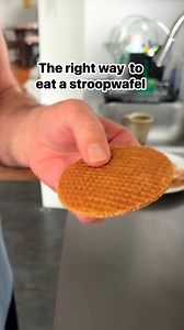 82K views · 1K reactions | Apparently this is the right way to eat a stroopwafel | A Life Less Scripted | Facebook