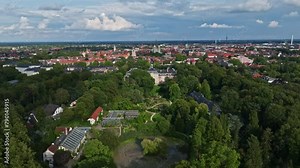 Aerial drone view of University of Münster ( Westfälische Wilhelms-Universität-Münster ) in Germany . This prestigious university has a historic botanical garden .