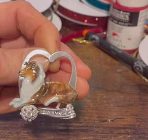 20 reactions | Store - www.originalsbylaura.com Fine Silver Glass Enameled Sheltie Pendant uniquely hand-created ensuring a one-of-a-kind piece. Measuring 1.5 inches high and 1.5 inches wide, this pendant showcases 90% fine silver (.999), complemented by sterling silver (.925) Award ribbon is delicately set with a sparkling CZ stone. | Originals by Laura Animal Art & Jewelry For Sale | Facebook