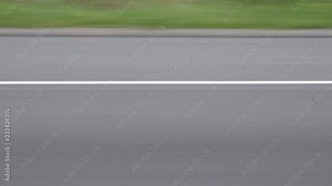 Background of highway asphalt passing. Great background for text or copy. Stock Video
