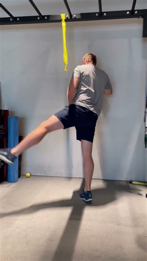 Cross body leg swings with calf raise