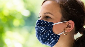 VERIFY: Yes, you should wash reusable face masks after using them