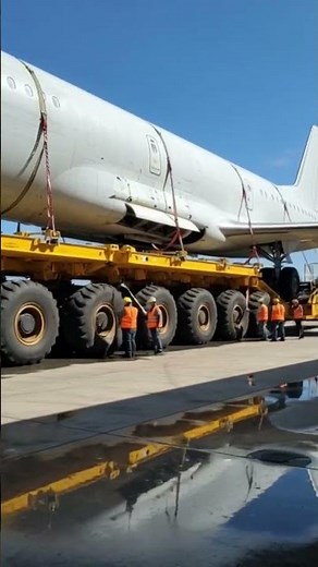 Absolute Unit: Hauling a Whole Plane on This Massive Flatbed Truck!
