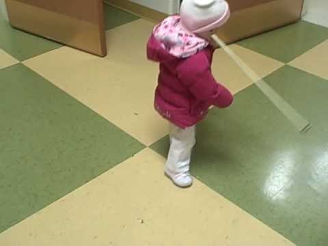 Toddler who is blind uses cane to navigate and learn her world