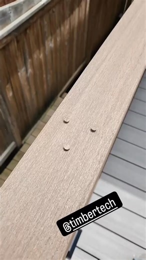 You can use deck boards as the drink rail of Timbertech railing. We plug the screw holes with Starborn pro-plugs. | Aztec Decks