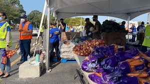 Hundreds of military families line up at drive-through food bank