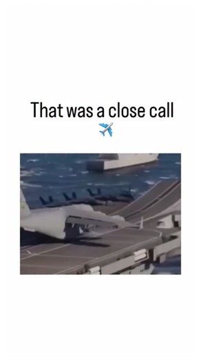 Exiasglobal on Instagram: "The post shares a 13-second AI-generated video depicting a U.S. Air Force C-5 Galaxy cargo plane accelerating down a ramp on an aircraft carrier, dipping perilously low over the ocean before pulling up, captioned "That was a close call." Factually impossible: Aircraft carriers launch fixed-wing planes via steam catapults, not ski-jump ramps (used on some non-U.S. carriers for lighter jets), and the C-5's 222-foot wingspan exceeds standard carrier deck widths of about 1