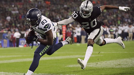 David Moore high-points beautiful sideline pass