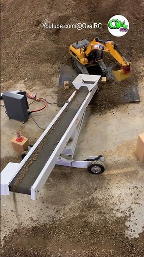 Custom built dirt conveyor that moves side to side
