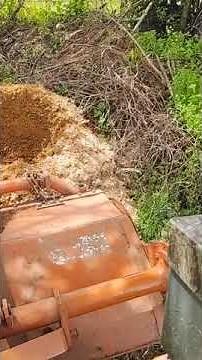 Lazy homesteaders way to turn a compost pile using a tiller on a tractor