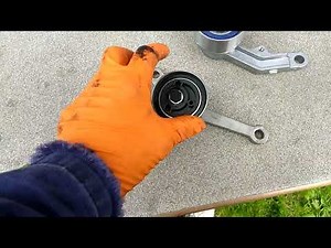 Chrysler PT cruiser old and new timing belt tensioners