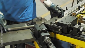 metal bending. close-up. hydraulic press or bending machine for metal. operator is working on bending metal machine