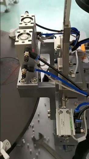 Actuator nozzle assembly machine