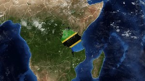 4K Globe Map of Tanzania with a flag