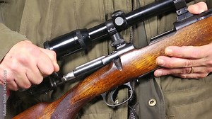 Reloading a rifle - slow motion Stock Video