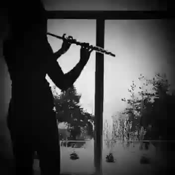 Mysterious Flute Player in Snowy Landscape