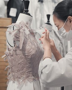 319K views · 10K reactions | Look inside the atelier flou to discover the special savoir-faire behind three Autumn-Winter 2021-2022 Haute Couture on.dior.com/couture-aw21-22 evening dresses by Maria Grazia Chiuri that feature bodices woven in organic-effects with hand-pleated bands of chiffon, one with an open braided back like the spreading branches of a tree. © Film by Melinda Triana | Dior | Facebook