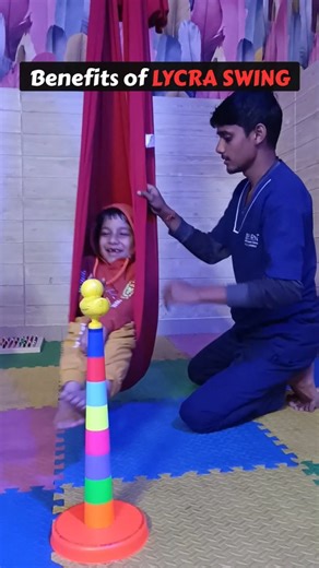 REBORN | Child Development Centre on Instagram: "What is a Lycra swing and how does it help children? Our therapist explains the amazing benefits of this therapeutic tool😌✅ used for sensory regulation in our therapy sessions! The Lycra swing provides deep pressure input and a calming, cocoon-like sensation that helps children with sensory processing difficulties feel grounded and regulated. Watch as our therapist demonstrates how we use the Lycra swing to help children calm down, improve body a