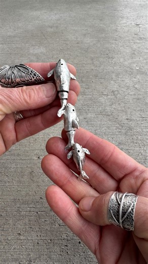 Meet Oceana, the omnipotent orca and her obliging pod. Fused sterling silver coiled wire, and hand carved. #nicoleringgold #handfabricated #orcas | Nicole Ringgold Jewelry Designs