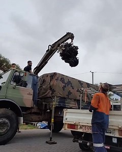 3.8K views · 83 reactions | The ex-Military Unimog Cargo Crane in action  @unimog86 making light work of this engine. | Australian Frontline Machinery | Facebook