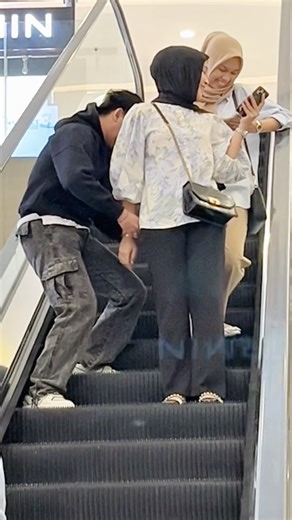 Handcuff prank escalator #prank #viral #funny