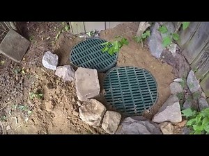 Two catch basins installed into existing drain