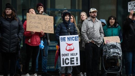 Protesters gather outside Hootsuite headquarters in response to contract with ICE