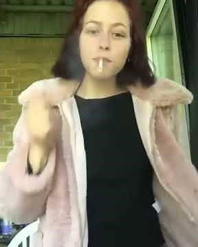 Girl Smoking Cigarettes