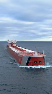 The 1000’ Edwin H. Gott makes a close pass by Grand Marais, MN to avoid large waves in the middle of Lake Superior. 📷Nathan Klok Photography | Nathan Klok