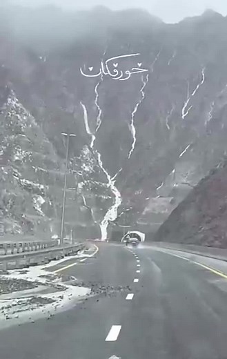 Scenic Drive Through Snowy Mountains and Tunnels