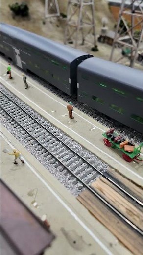 A classic F-M Trainmaster expertly pilots a Commute train into Martinez Depot on our HO layout