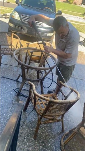 Refinish wood using a pressure washer