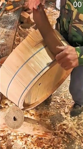 Hammer tightens barrel hoops wood staves bound securely