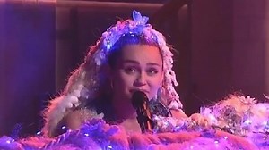 Miley Cyrus cries during performance on Saturday Night Live