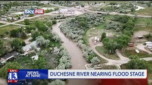 Duchesne River under flood warning, homeowners bracing with sandbags