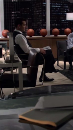 Suits Characters Louis Litt and Mike Ross Discussing a Cab Scene