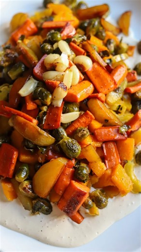 Sara Tercero/Betterfoodguru on Instagram: "PERFECT VEGGIE SIDE🥕 Why can’t veggies be the star of the show? I say they can be, especially when they taste this good! Just comment “send me the recipe” and I will dm you the recipe link for these insanely delicious Roasted Veggies with whipped tahini that will blow your mind! #eatyourveggies #veggiesides #holidaysides #plantbasedrecipes #thanksgivingrecipe https://betterfoodguru.com/roasted-veggies-with-whipped-tahini/"