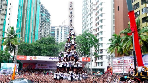People create human pyramid 10 rows high