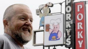 Porky's Drive-In neon sign coming down