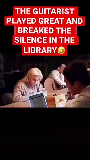 THE GUITARIST PLAYED GREAT AND BREAKED THE SILENCE IN THE LIBRARY