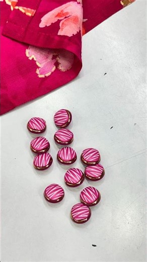 Customised collar neck A-line kurthi with pink buttons by Divyasree Designer Boutique, Kukatpally