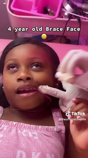 Cute Brace-Faced 4-Year-Old Girl Smiles Brightly!